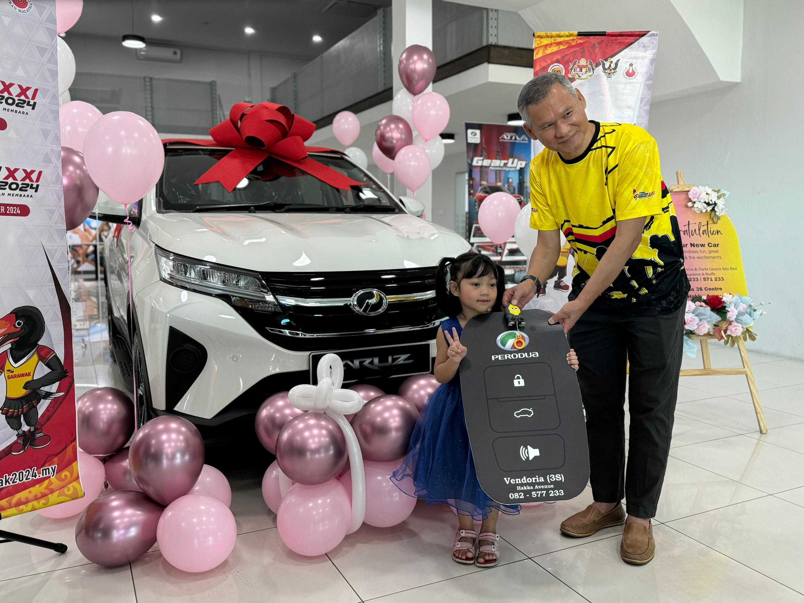 S’wak govt celebrates public support for Sukma 2024, 5yo Ainul wins Perodua Aruz in grand lucky draw