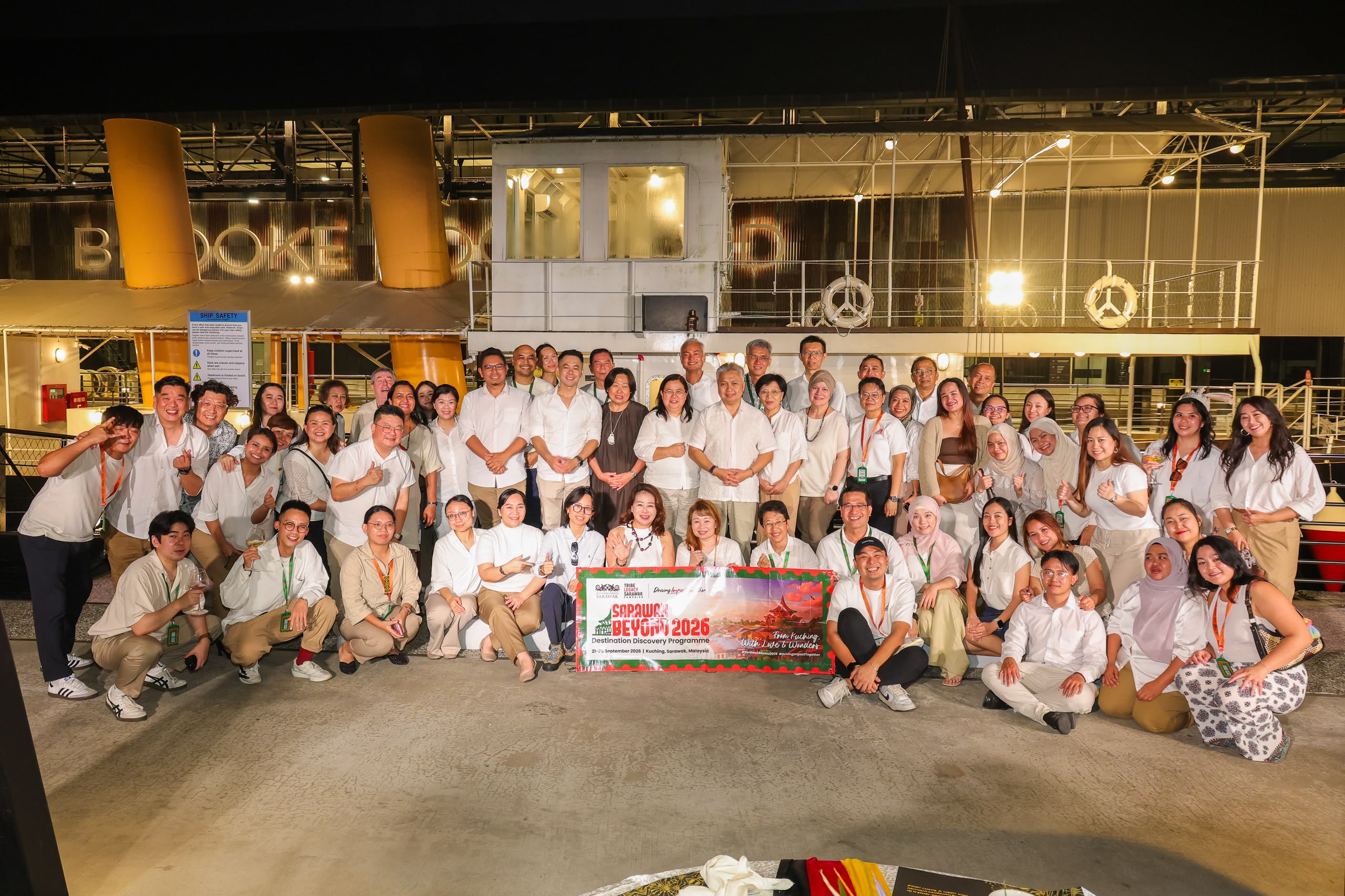 Business delegates swap conference rooms for community experiences