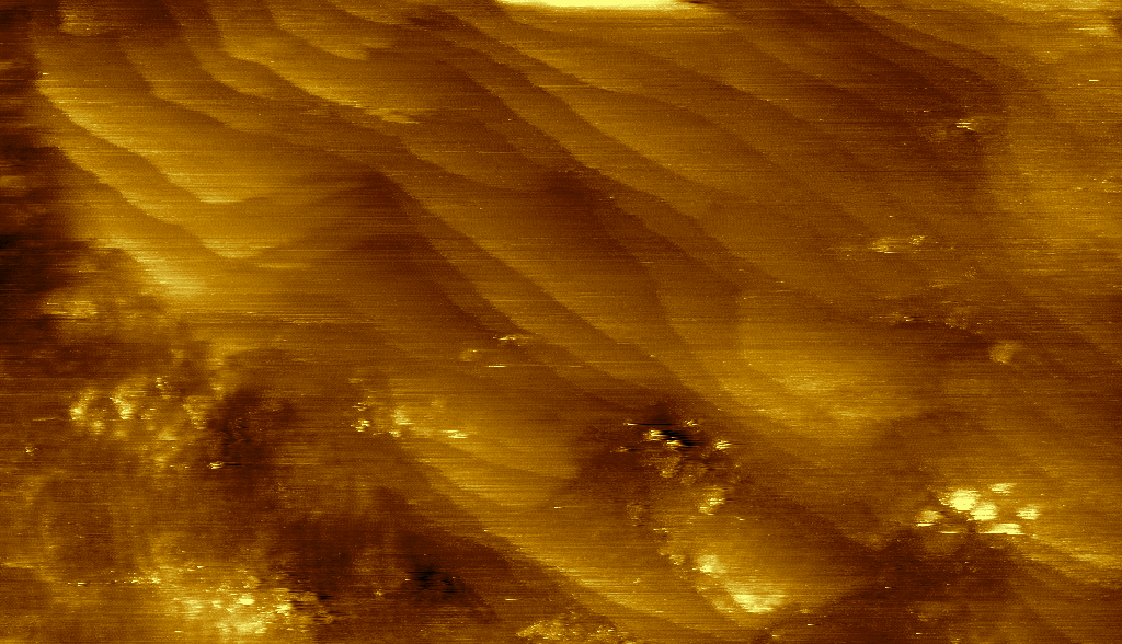Atomic planes in gold. Constant-current mode, 1 nA, 50 mV bias.