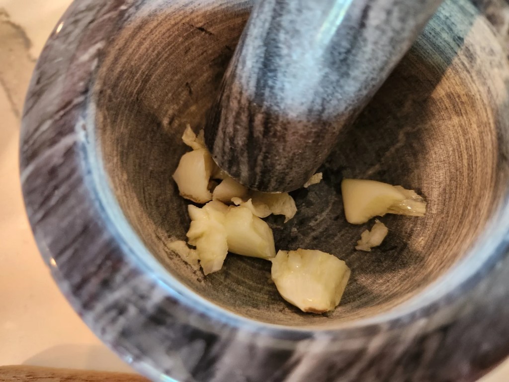 Raw Garlic Mashed to Release Allicin in Mortar