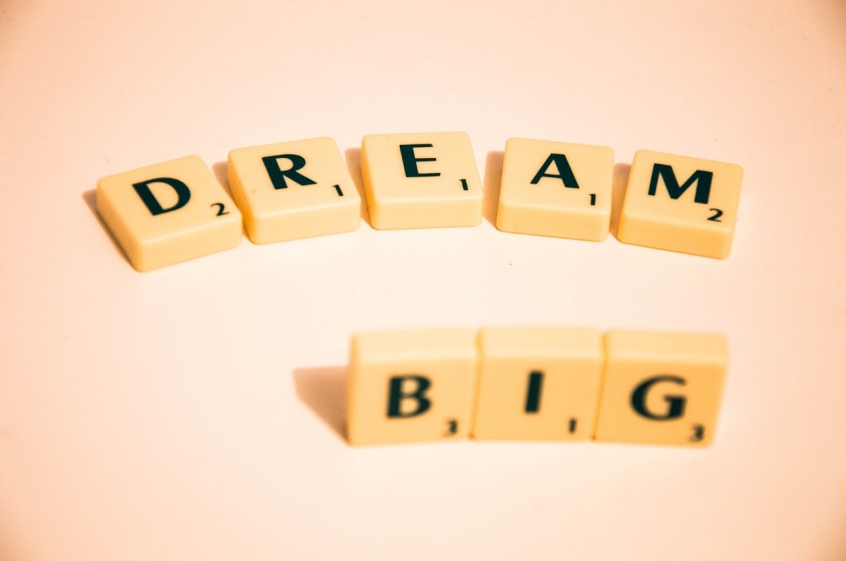 The words Dream Big spelled out in Scrabble tiles
