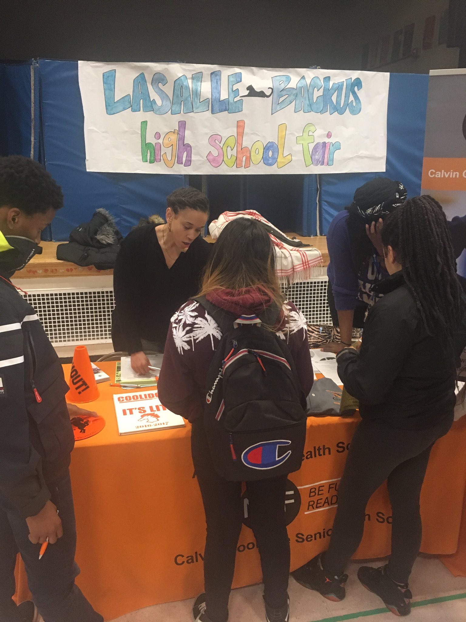 Early College Academy Director Nicole Savage attends the high school fair at La Salle-Backus Education Campus to promote the Early College Academy