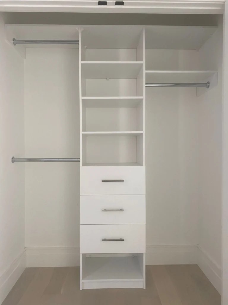 Reach-in white shelfs and drawers