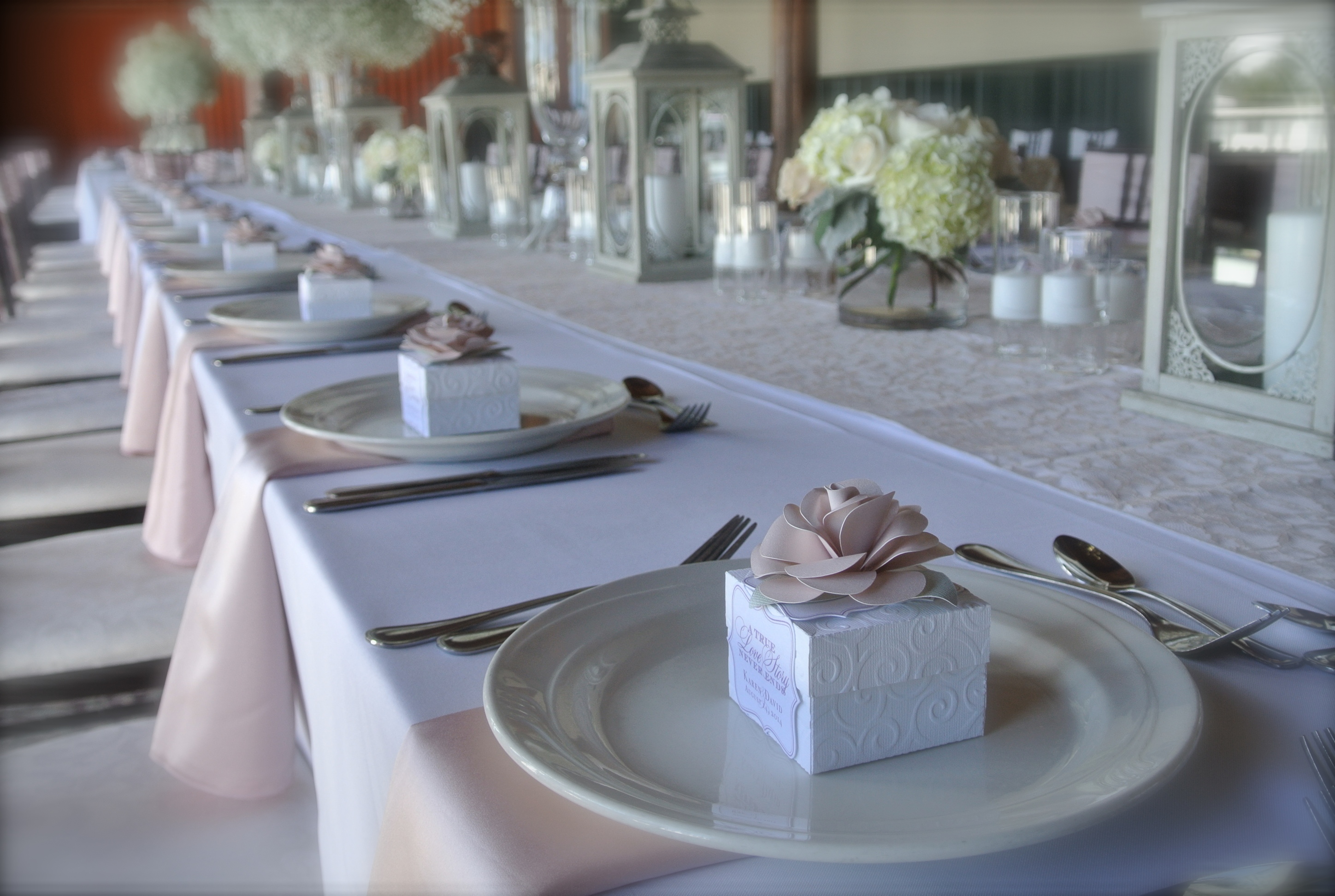 handmade paper roses adorn each favor box