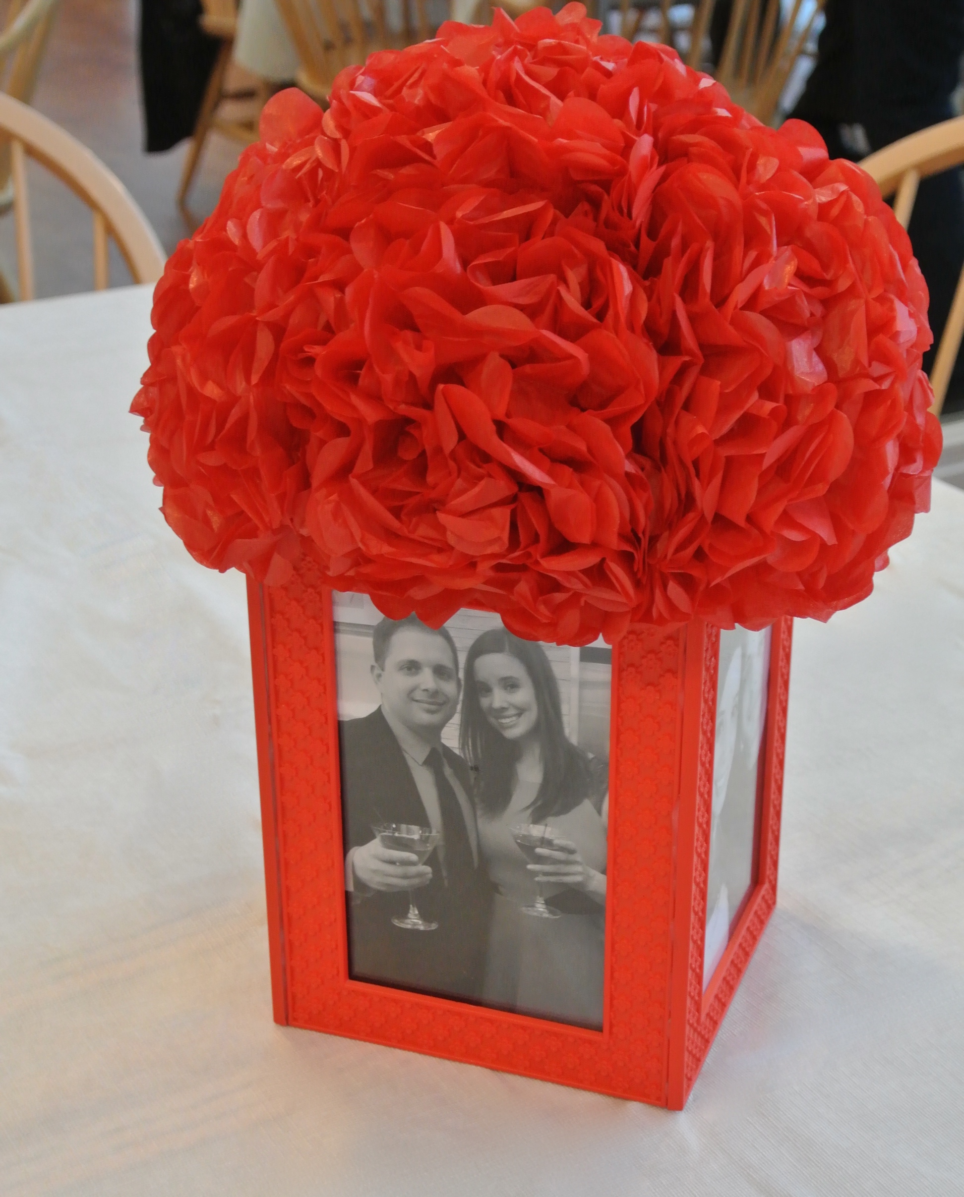 centerpieces - simple frames with tissue flowers.