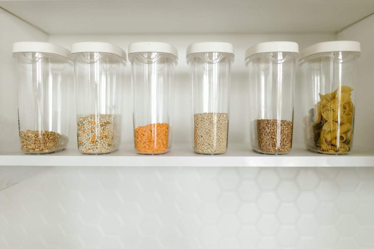 Food in Plastic Containers on a Shelf