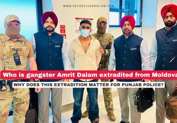Punjab Police officials escort extradited gangster Amrit Dalam after his return from Moldova