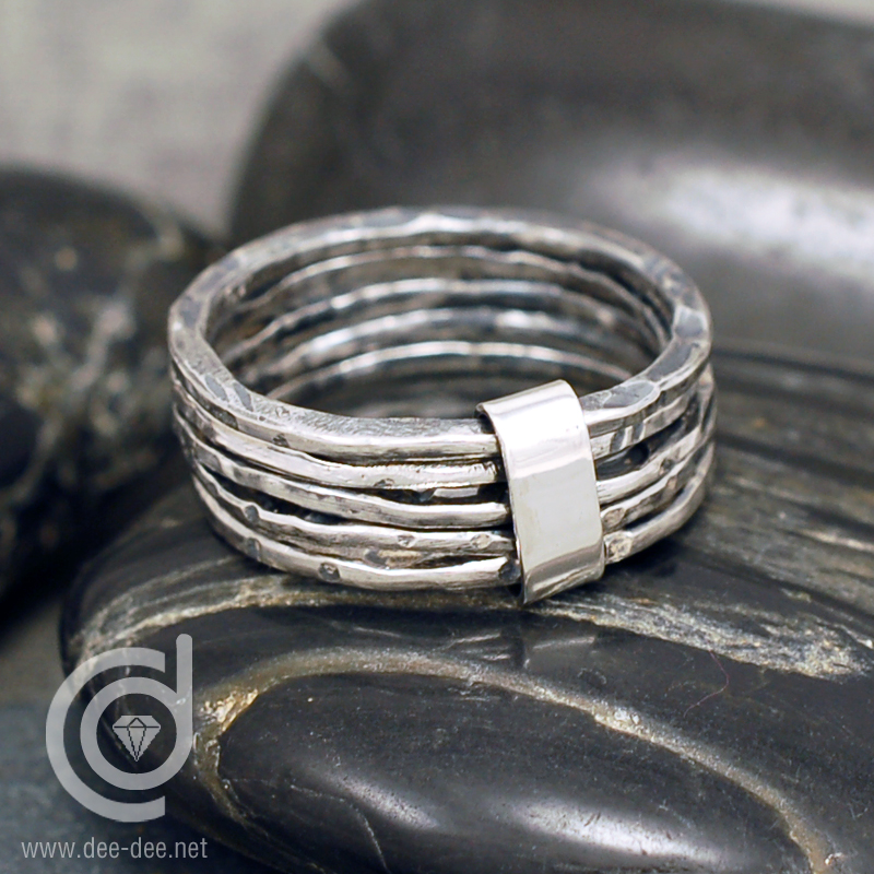 5 alianças ligadas em prata