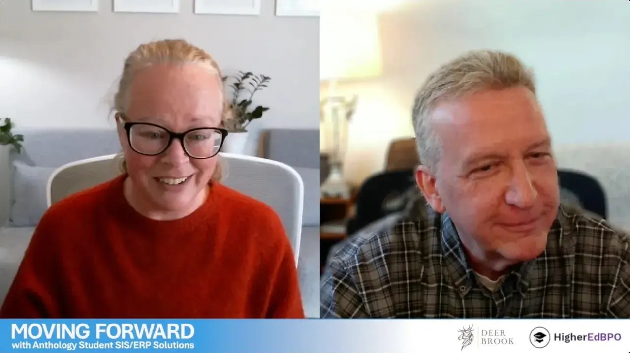 Two people in their offices recording a podcast.