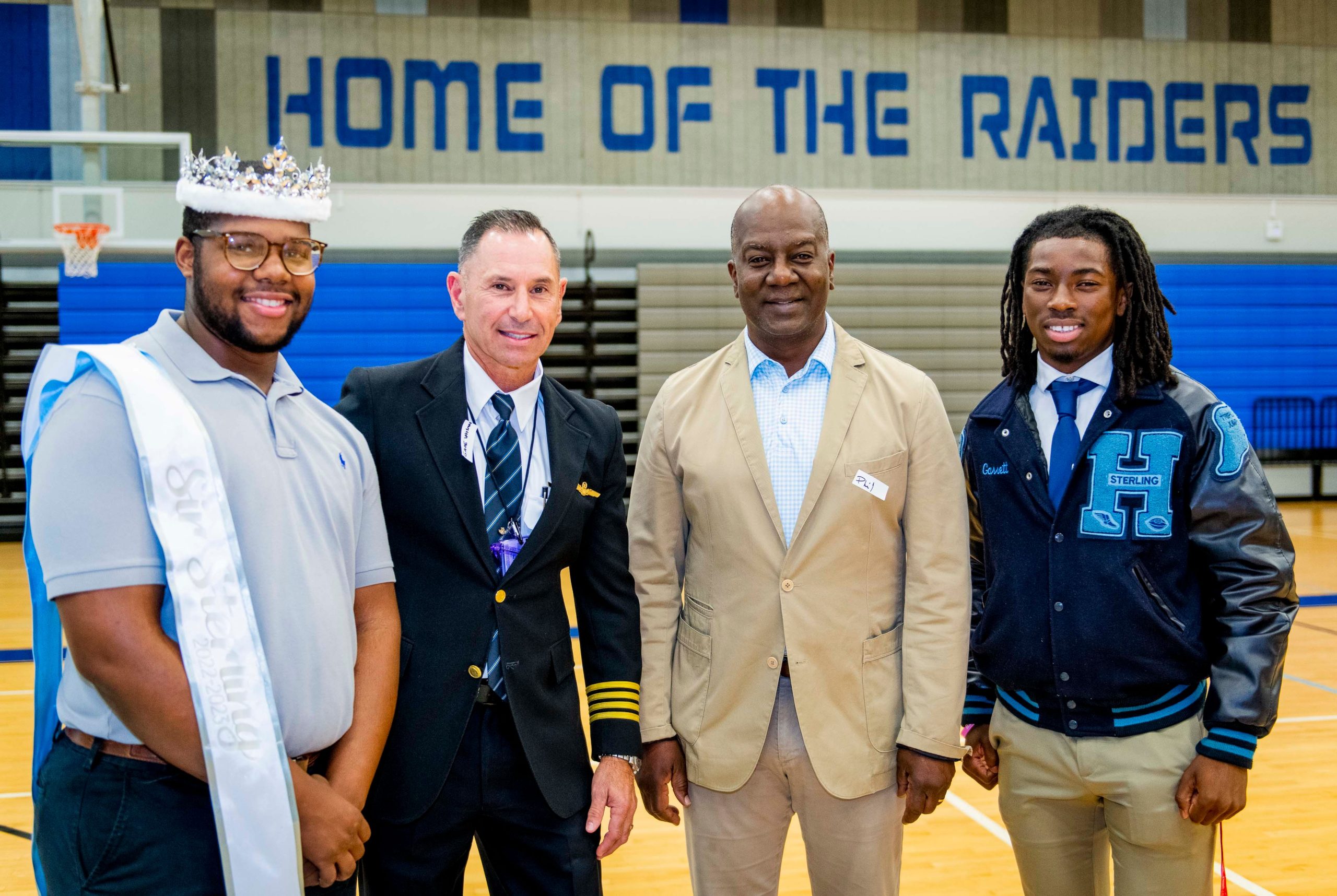 Phil Griffith (third from left) at Sterling Aviation High School. Photo courtesy United Airlines.