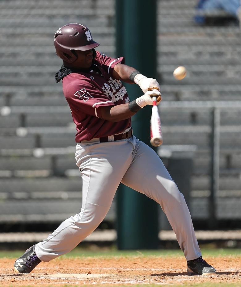 Heights Bulldogs third baseman Paul Smith takes his turn at bat