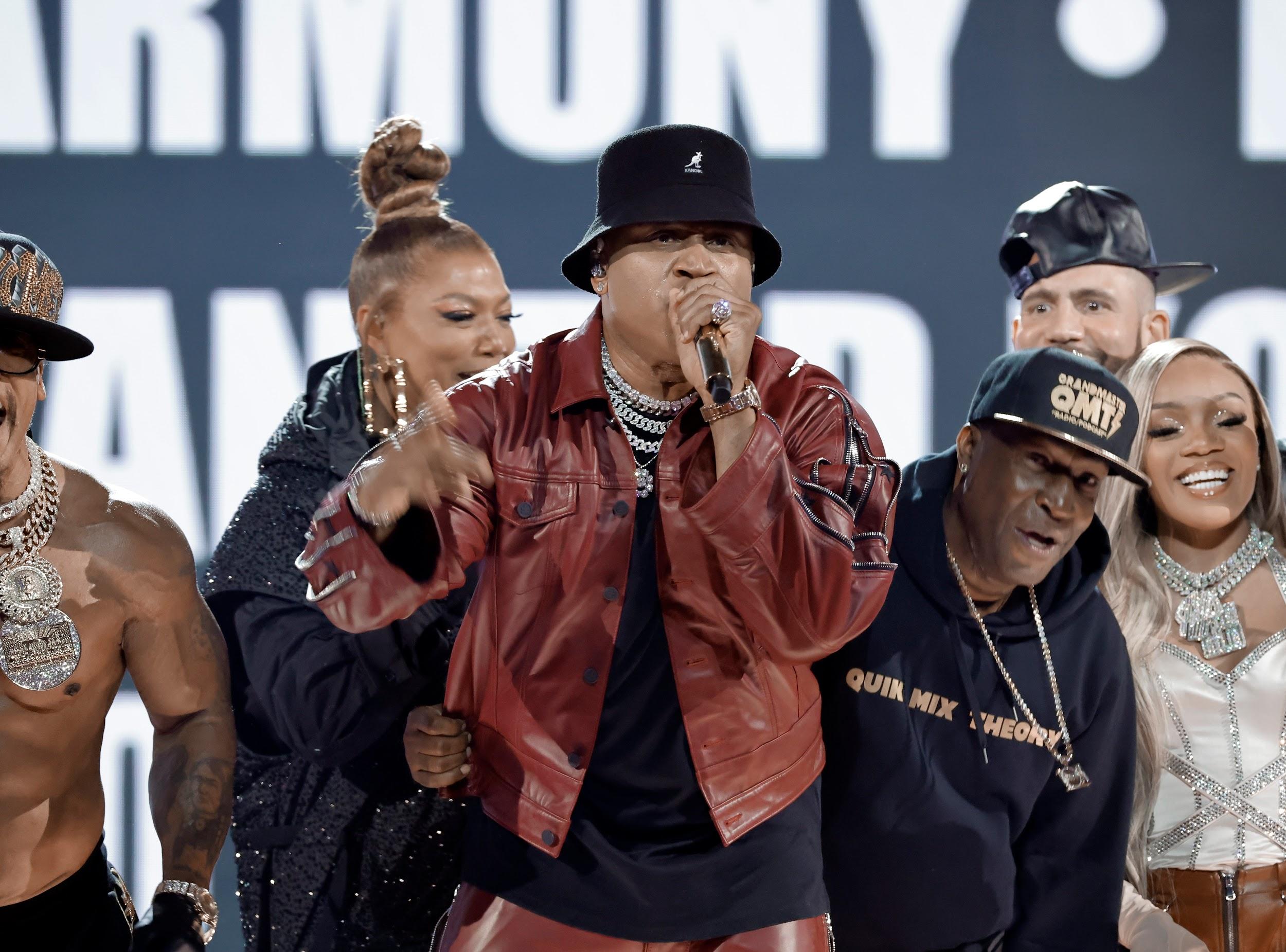 (L-R) Queen Latifah, LL Cool J, Grandmaster Flash, and GloRilla peform onstage during the 65th GRAMMY Awards.