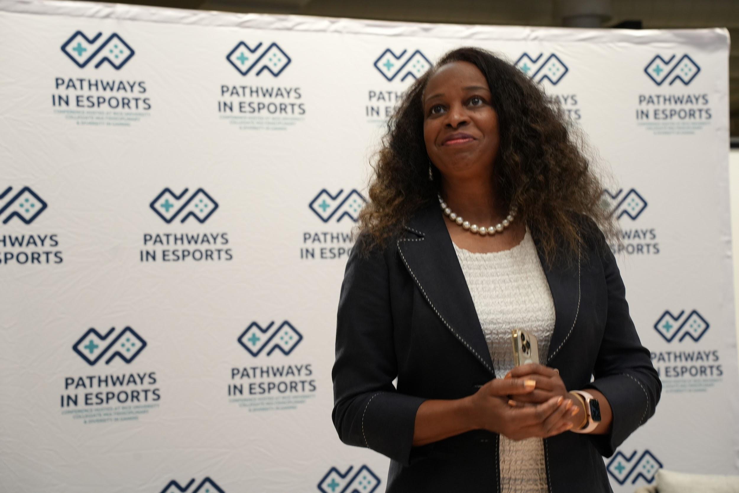 Image of Dr. Allysia Kizzee against a background white background with logos on it