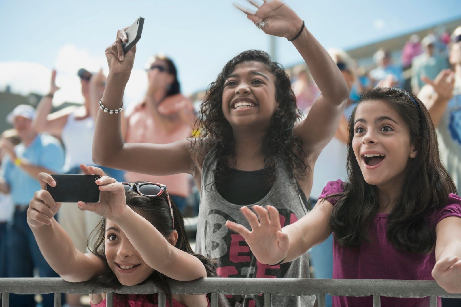 Young fans at a concert.