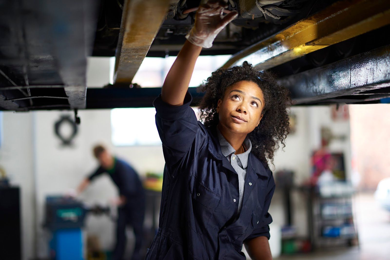 A young female adult mechanic.
