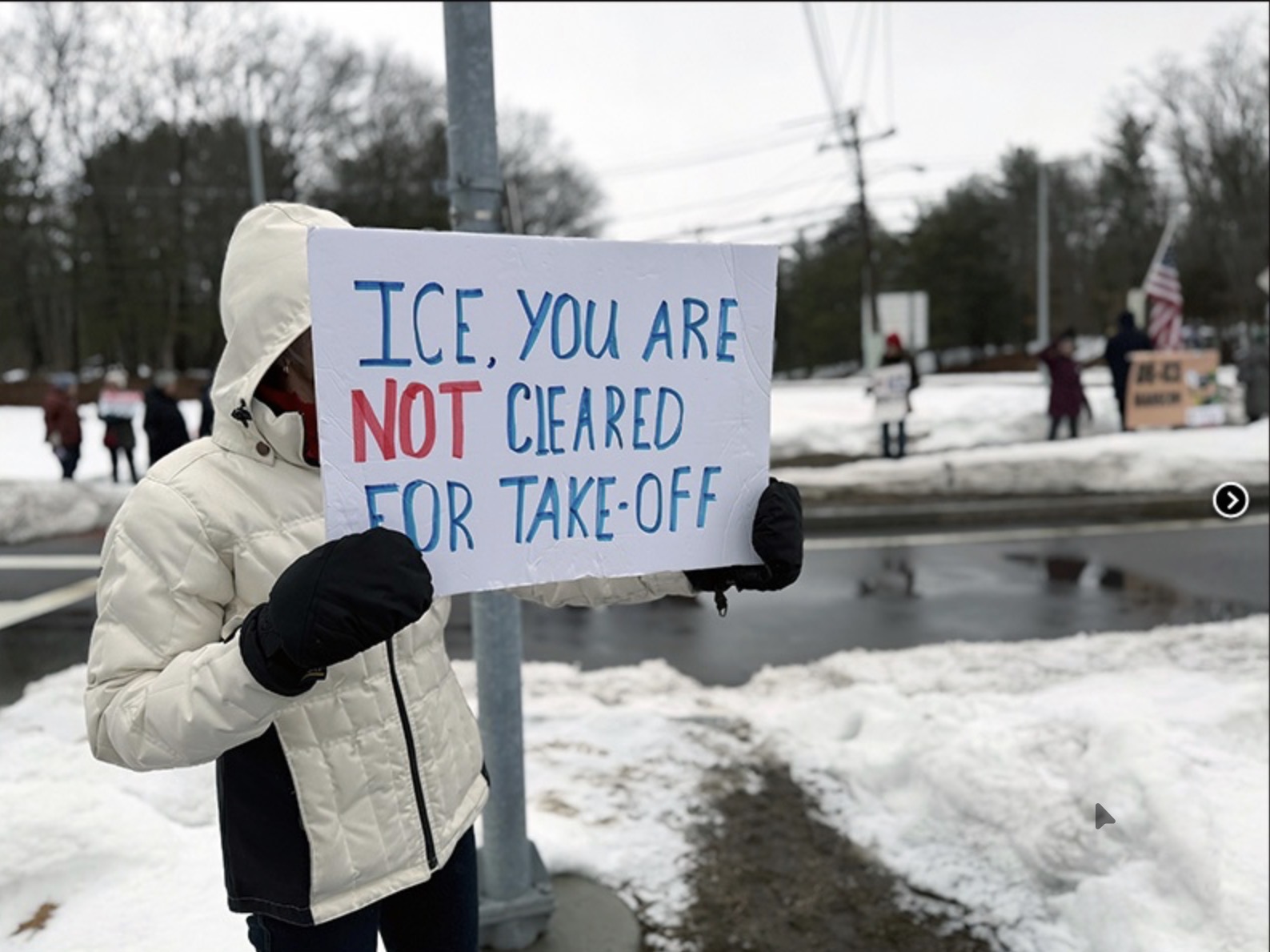 Protesters Stand Out Against ICE at Hanscom