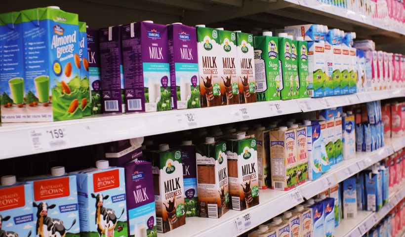 shelves with various milk boxes
