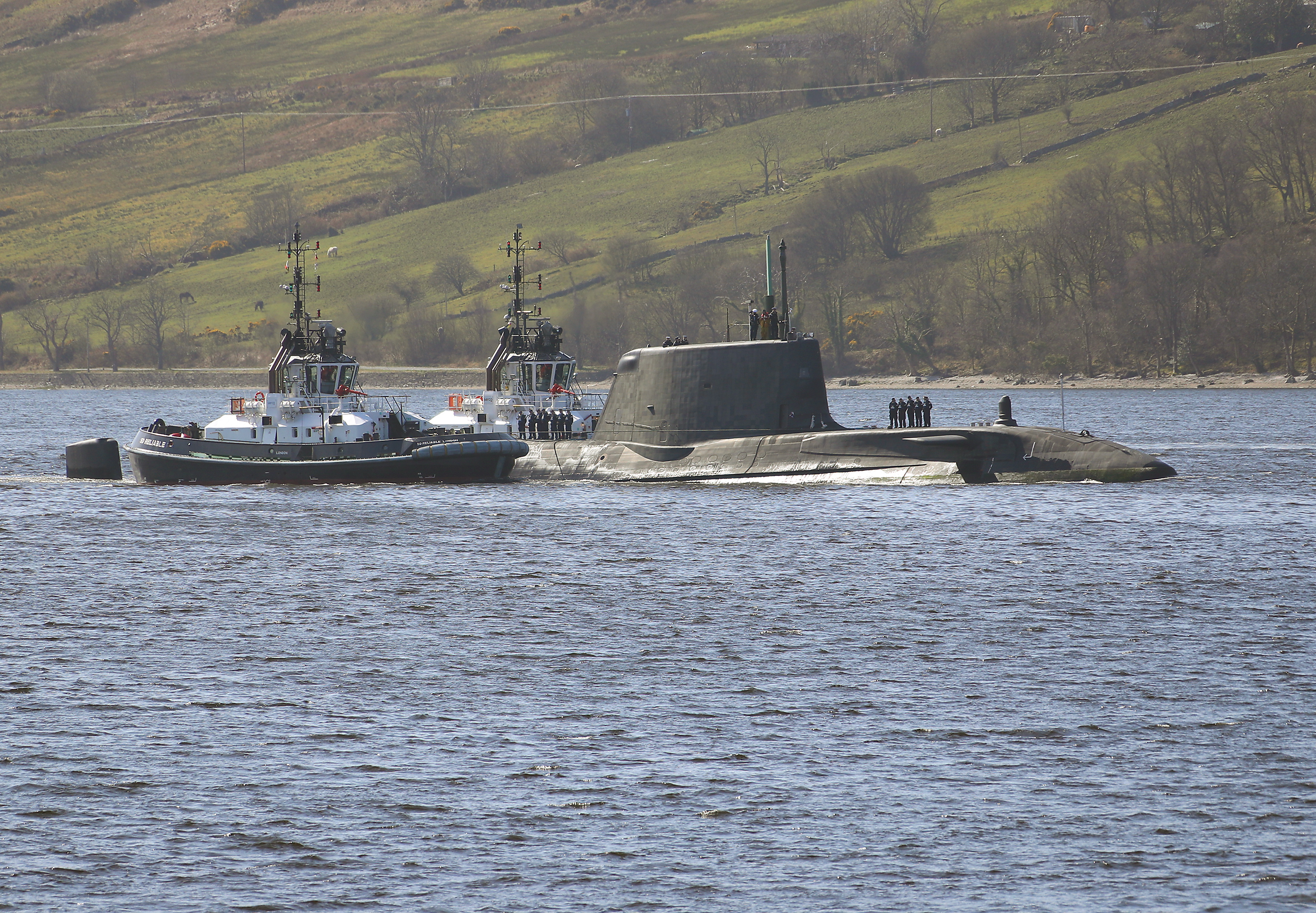 HMS AUDACIOUS ARRIVES AT CLYDE HOME HMS Audacious, the fourth of the Royal Navys Astute-class submarines, has arrived at her new home at HM Naval Base Clyde. The new submarine and her 98-strong crew arrived at the Naval Base in Argyll and Bute today (April 7), flying the White Ensign after sailing from BAE Systems in Barrow-in-Furness. Welcoming the vessel to her new home were members of the Submarine Flotilla  SUBFLOT  based at Clyde. It is with great excitement that we welcome HMS Audacious to the Clyde, joining her three sister submarines, said Commodore Jim Perks OBE, Head of the Submarine Service. HMS Audacious represents an ever improving example of the world-leading Astute class submarine. She is right at the cutting-edge of technology, built here in the UK by our own people. She will provide the country with remarkable security at sea to protect our nations interests. HMS Audacious will join sister-submarines HMS Astute, HMS Ambush and HMS Artful which are already in-service and operating from Faslane. A further three boats  named Anson, Agamemnon and Agincourt - are currently under construction at BAE in Barrow. The Astute-class vessels are among the most sophisticated submarines ever constructed for the RoyalNavy.