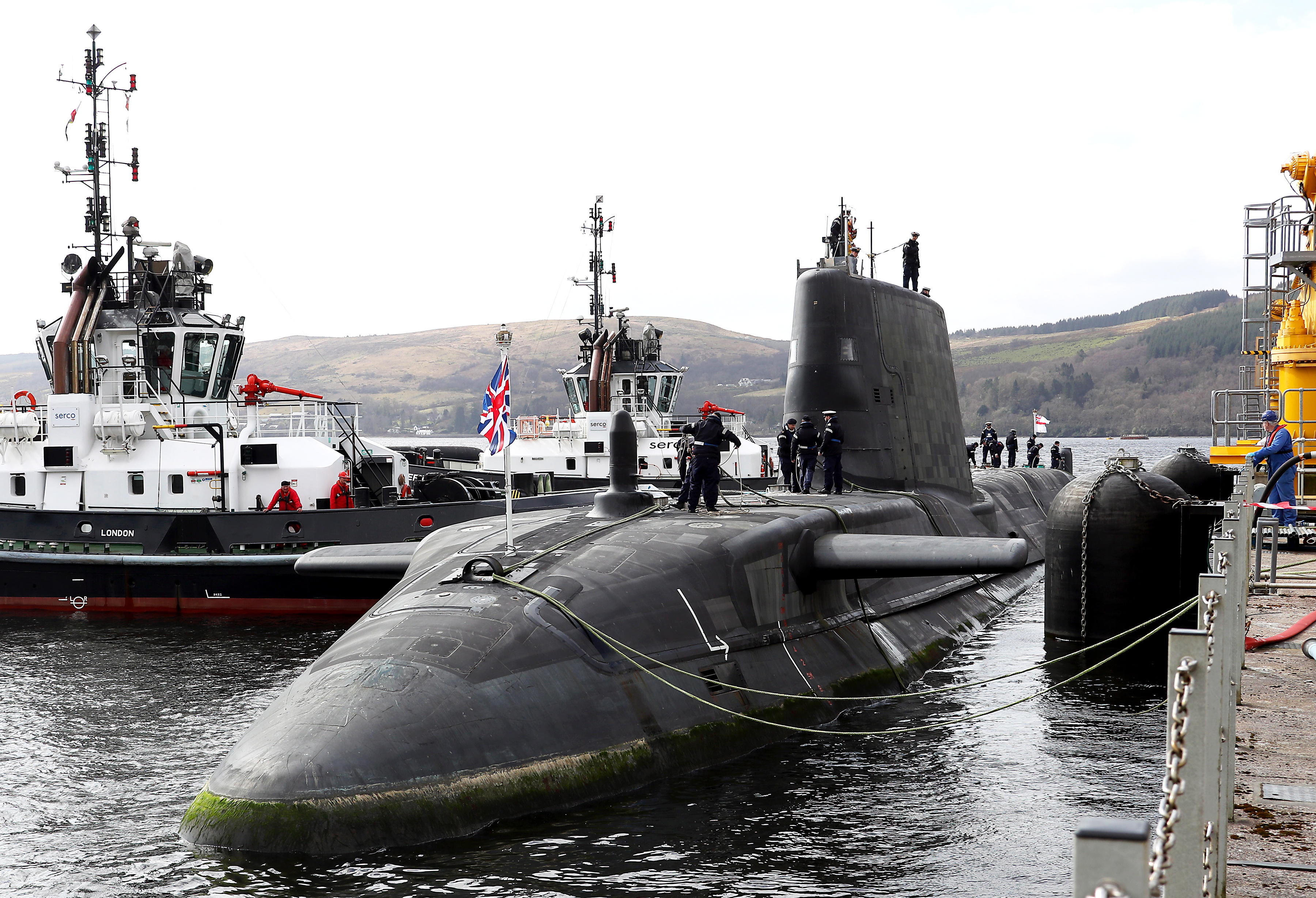 HMS AUDACIOUS ARRIVES AT CLYDE HOME HMS Audacious, the fourth of the Royal Navys Astute-class submarines, has arrived at her new home at HM Naval Base Clyde. The new submarine and her 98-strong crew arrived at the Naval Base in Argyll and Bute today (April 7), flying the White Ensign after sailing from BAE Systems in Barrow-in-Furness. Welcoming the vessel to her new home were members of the Submarine Flotilla  SUBFLOT  based at Clyde. It is with great excitement that we welcome HMS Audacious to the Clyde, joining her three sister submarines, said Commodore Jim Perks OBE, Head of the Submarine Service. HMS Audacious represents an ever improving example of the world-leading Astute class submarine. She is right at the cutting-edge of technology, built here in the UK by our own people. She will provide the country with remarkable security at sea to protect our nations interests. HMS Audacious will join sister-submarines HMS Astute, HMS Ambush and HMS Artful which are already in-service and operating from Faslane. A further three boats  named Anson, Agamemnon and Agincourt - are currently under construction at BAE in Barrow. The Astute-class vessels are among the most sophisticated submarines ever constructed for the RoyalNavy.