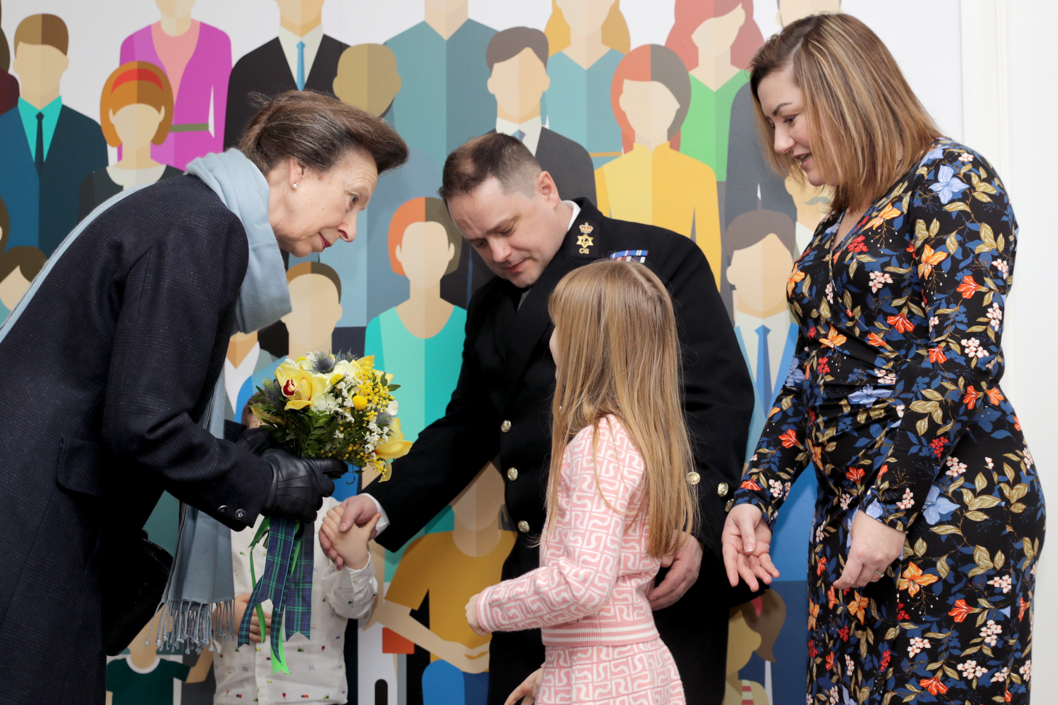 Pictured: HRH The Princess Royal is presented with some flowers from Lillie (7) and Ross (4) Wood. HER Royal Highness The Princess Royal opened a renovated facility at the heart of Helensburgh in Argyll and Bute today (January 24). The Drumfork Community Centre in Helensburghs Churchill Square has undergone £2M of work, with much of the funding coming from the Royal Navy and Royal Marines Charity (RNRMC). The new centre will be a hub for military personnel, their families and members of the wider community.
