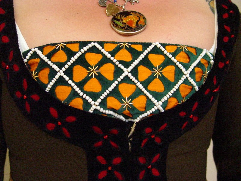 Close up of brustfleck and my Poppy medallion.