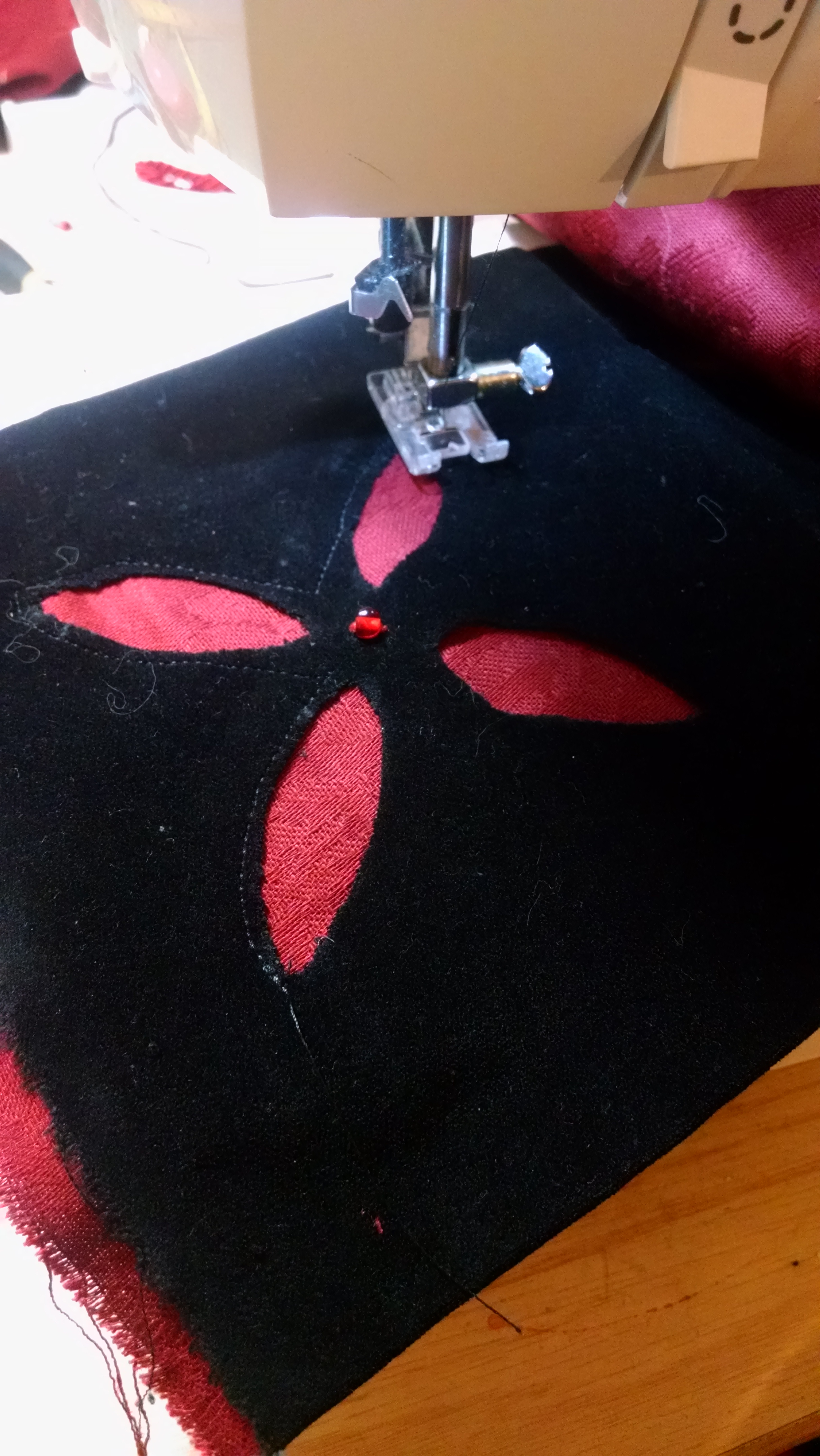 Machine sewing the edges so that I don't snag the holes on accident.