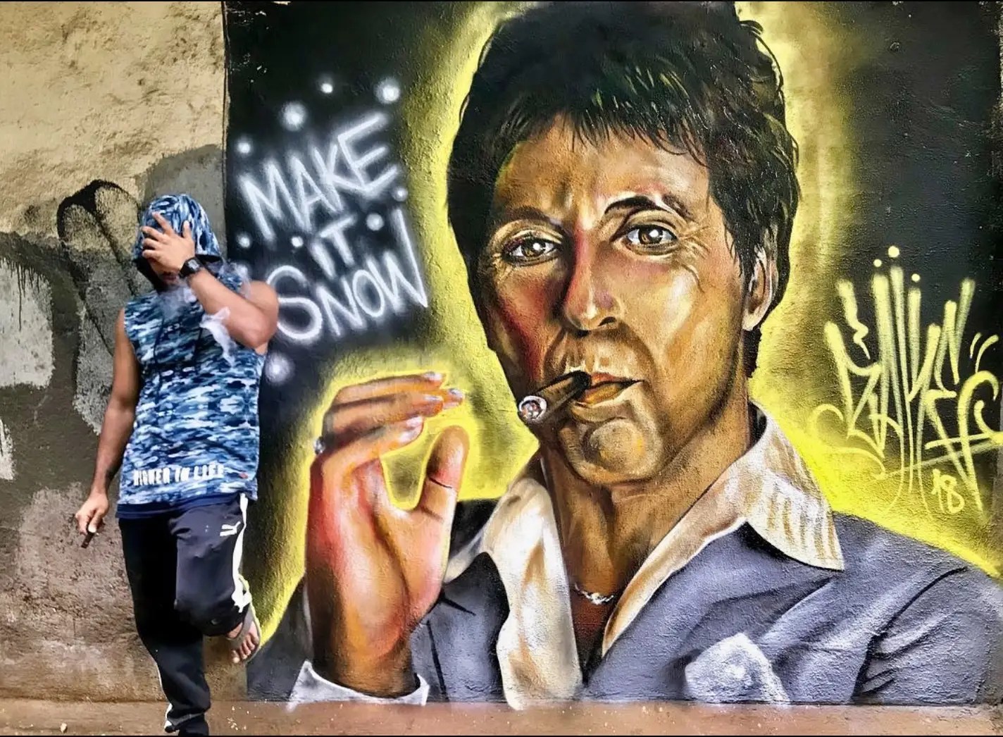 Zake Mumbai Graffiti artist, with his artwork