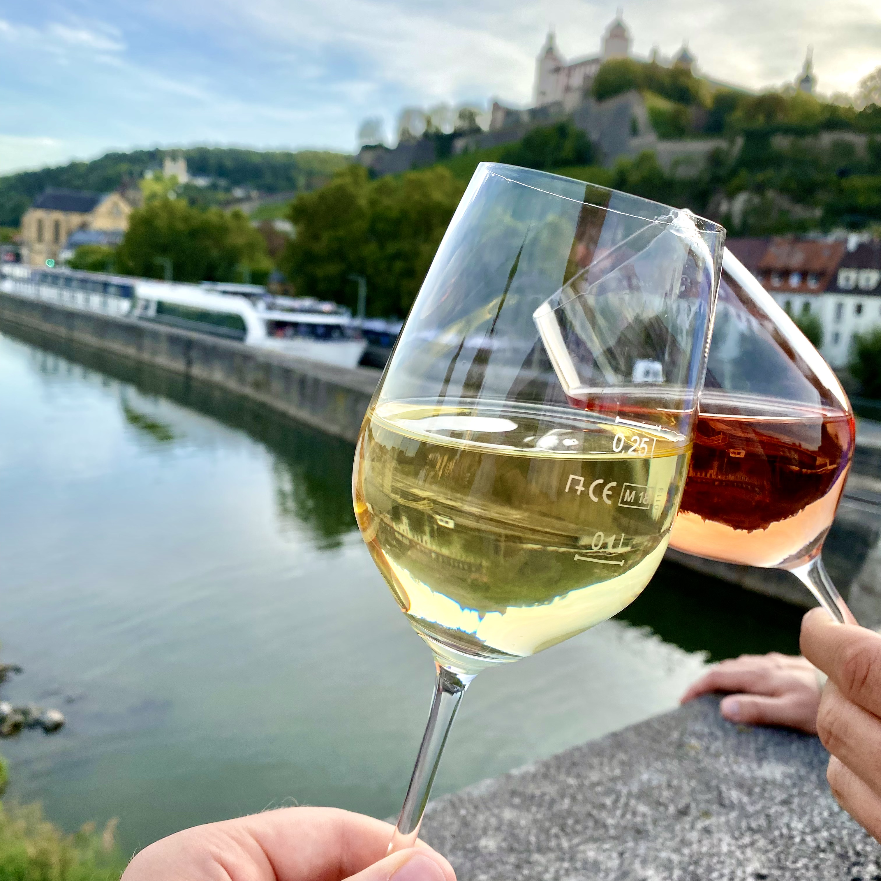 Cheering with wine glasses on Old Main Bridge (c) Destination Concierge