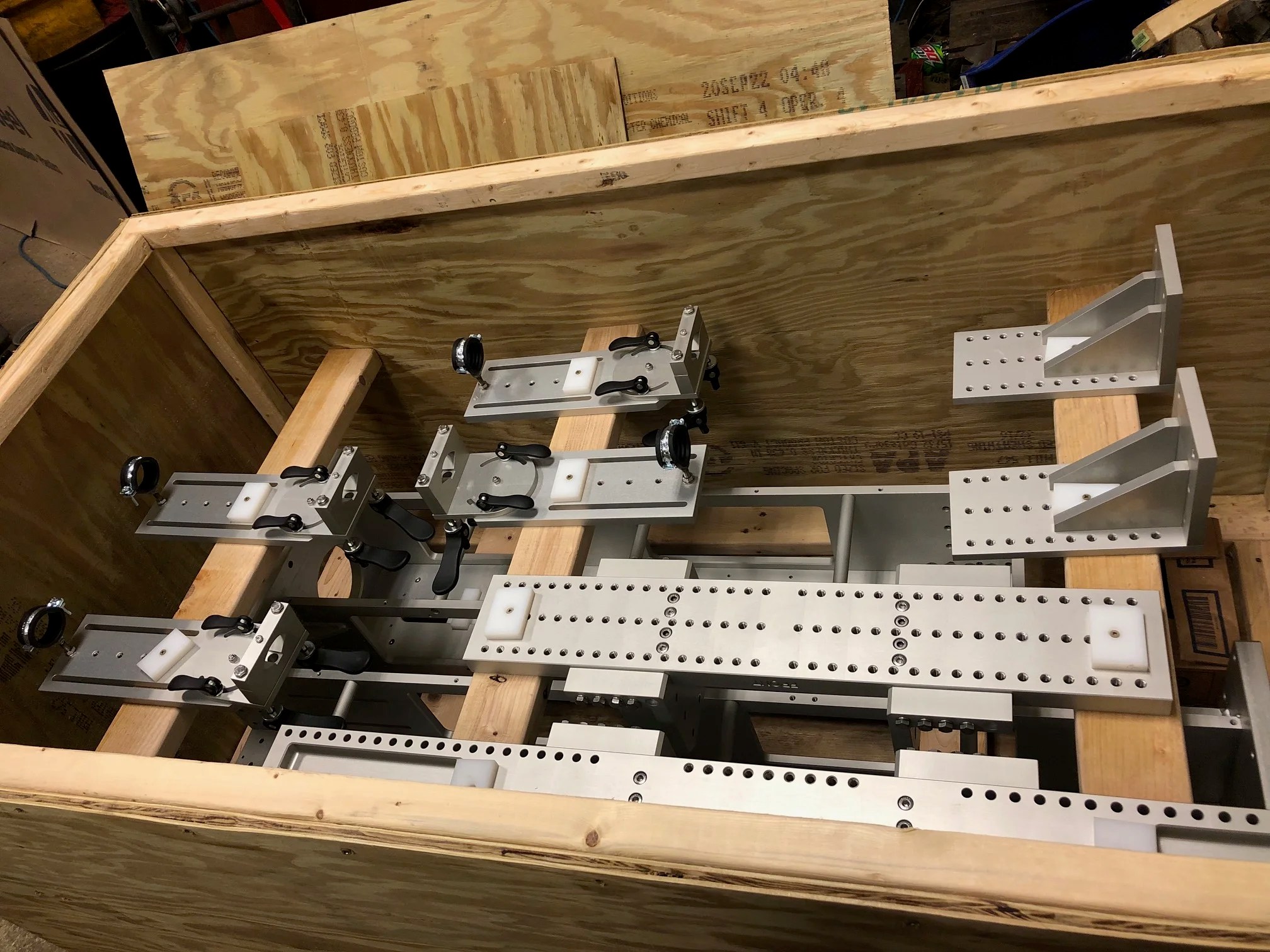 Anodized assemblies packed and crated for shipping.