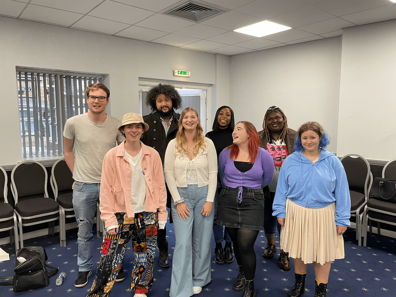 A group of lkickstarters - young people stood for a team photo