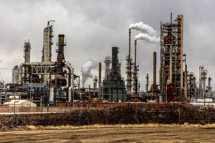 Industrial oil refinery emitting emissions — environmental compliance and regulatory law in Colorado.