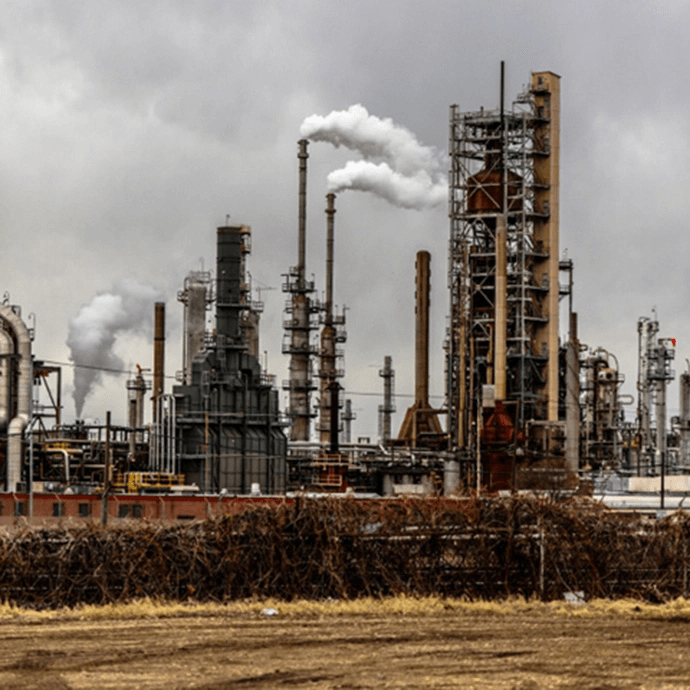 Industrial oil refinery emitting emissions — environmental compliance and regulatory law in Colorado.