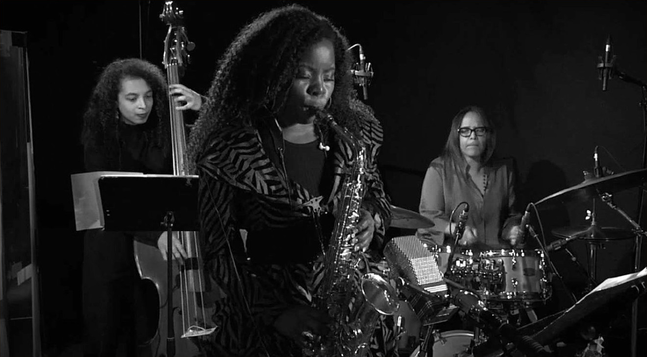 Devon performing with Terri Lyne Carrington and Tia Fuller.