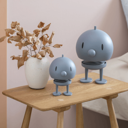 Hoptimist vrolijke decoratieve figuur