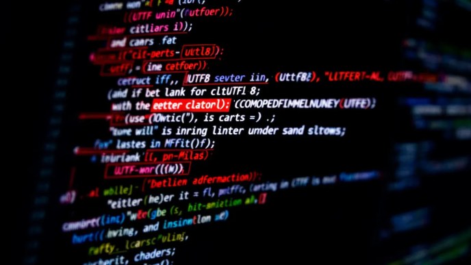 Frustrated developer looking at garbled UTF-8 text on a computer screen, struggling to fix character encoding issues.