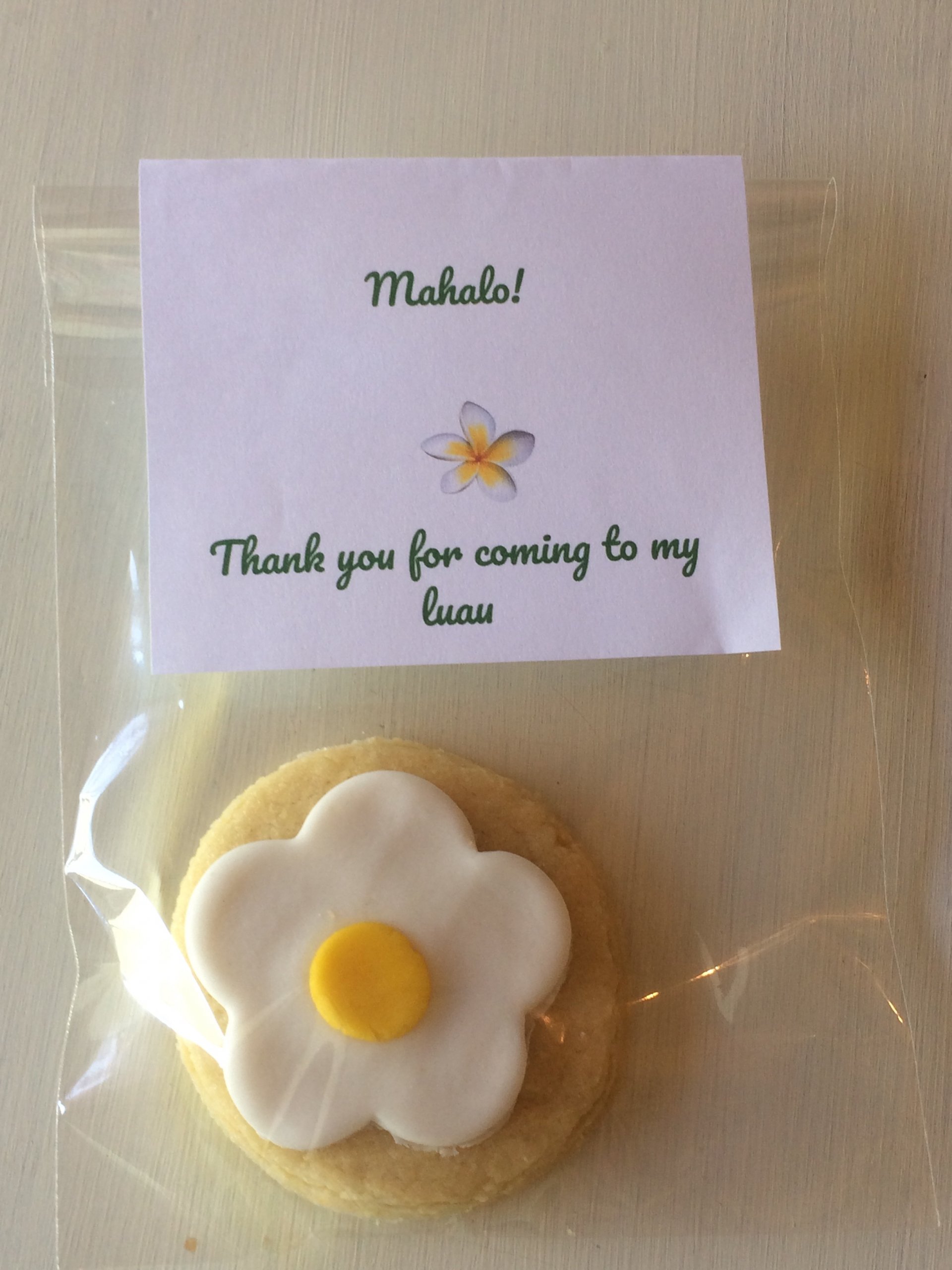 Hawaiian Luau party for kids - flower cookies as party favours