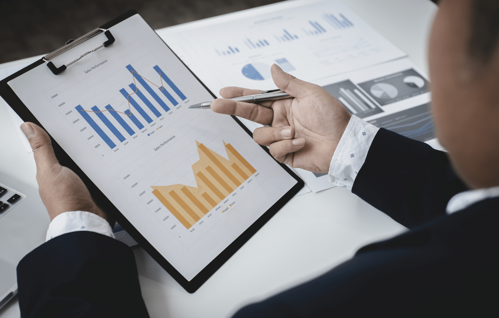 A business man looking at the graph of historical prices increasing for Diesel Fuel