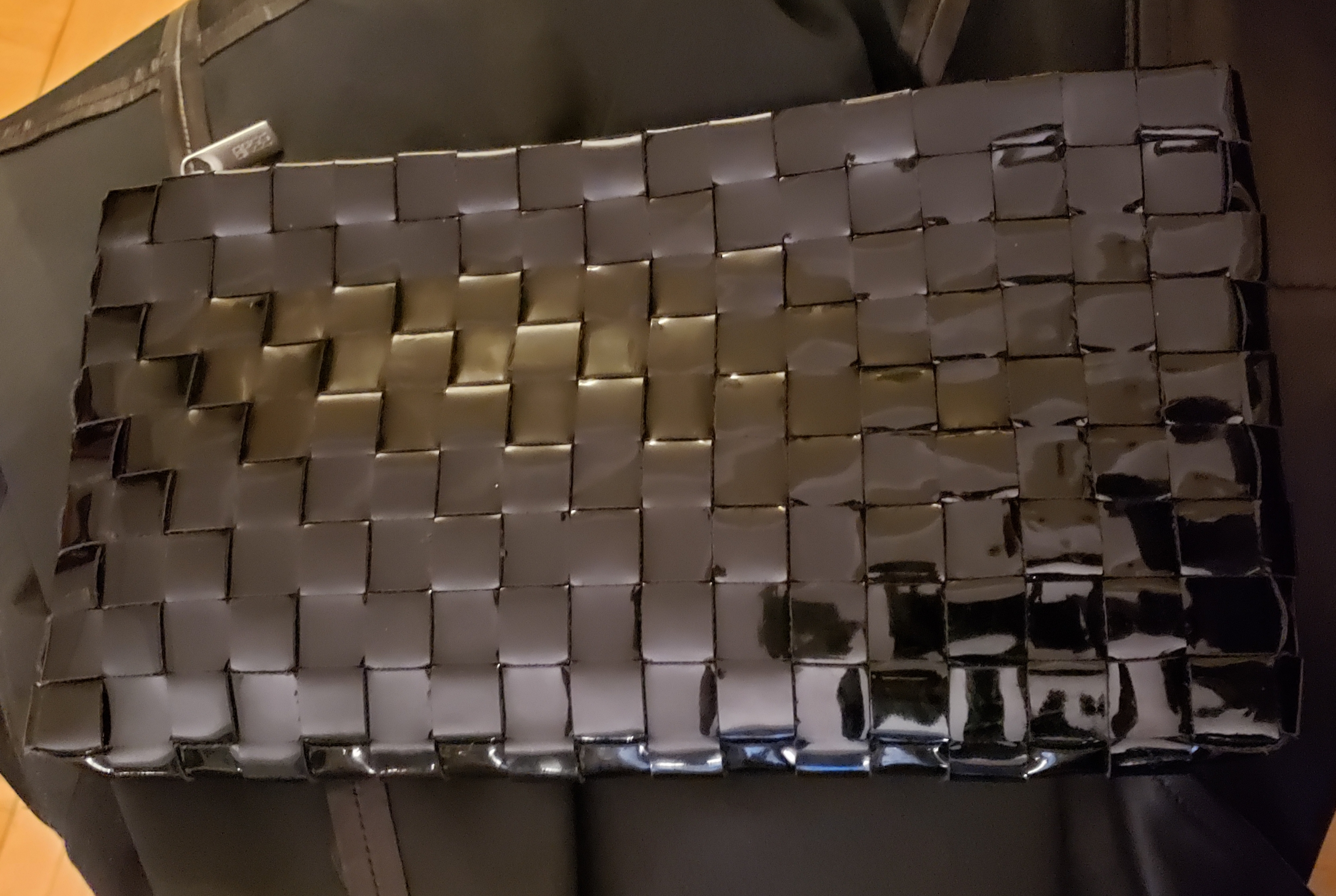 BREE black patent leather clutch