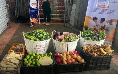 Surplus food items from public market feed 40 families in Bacolod