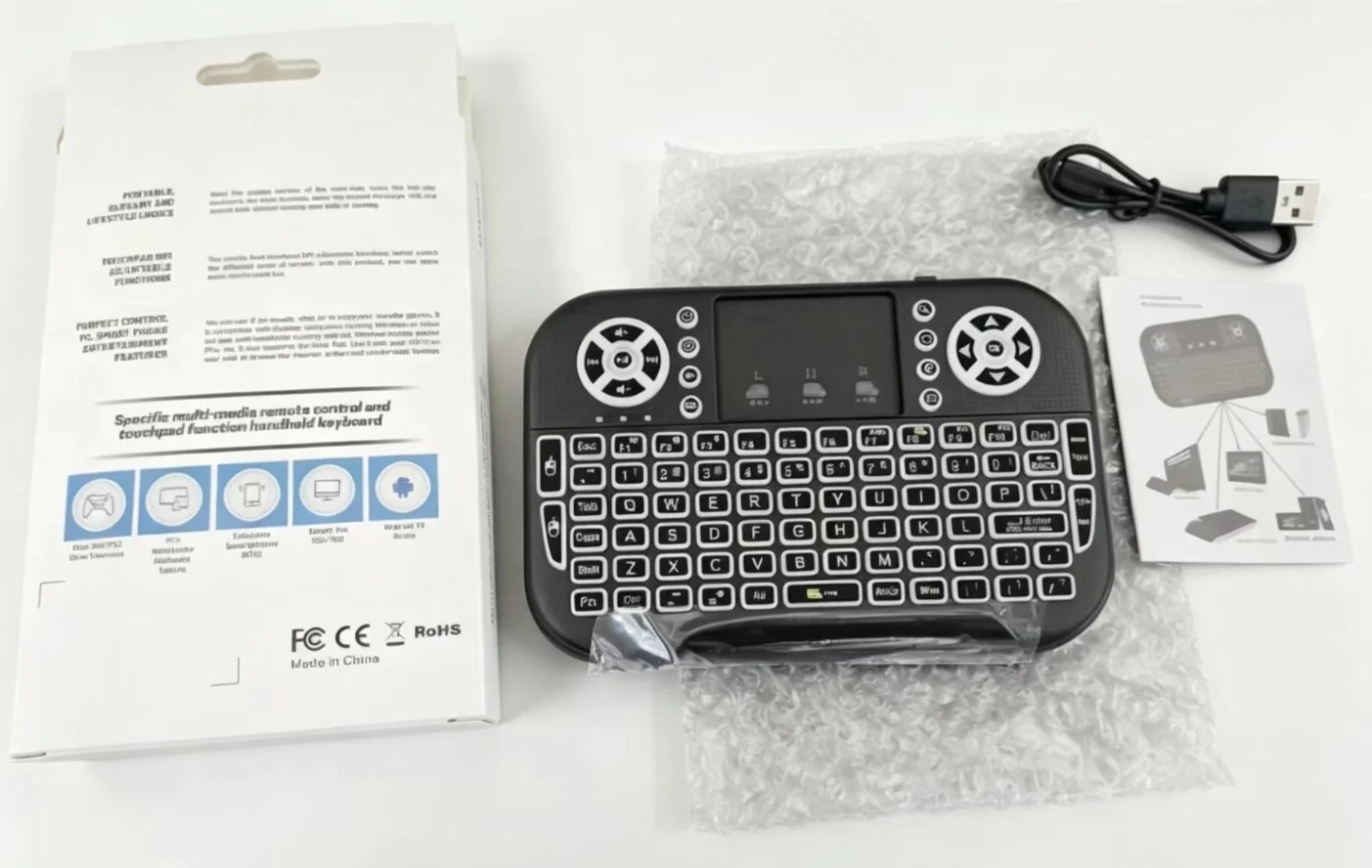 Compact Smart TV keyboard with touchpad and LED backlight