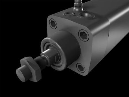 A close-up view of a hydraulic cylinder showcasing its metallic body, connection ports, and an attached threaded bolt. The background is black, highlighting the sleek design and mechanical components of the cylinder.