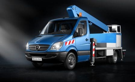 A blue Mercedes-Benz service vehicle equipped with a telescopic boom lift. It features safety stripes and an amber warning light on top, parked against a dark backdrop.