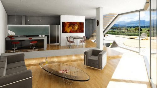 A modern living space featuring a sleek kitchen with a bar and red stools, a dining area with a white table, and a cozy seating area with gray chairs. Large windows offer a view of the outdoor landscape with mountains.