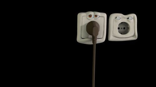 A cartoonish electrical socket with a facial expression, featuring two eyes and an attached plug. Next to it, another socket with a surprised expression has three circular holes, all set against a black background.