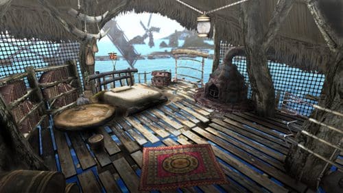 A cozy, rustic interior of a sea hut with wooden floors, featuring a round bed, a woven rug, shelves filled with books, and a cooking stove. Sunlight filters through the open structure, illuminating the serene view of the ocean outside.