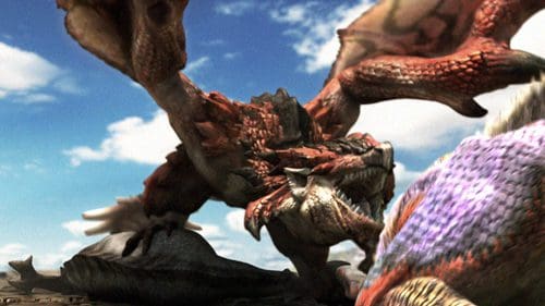 A massive, intricately detailed dragon with red scales and large wings looming over another dragon in a dynamic pose. The background features a bright blue sky with scattered clouds, set in an arid landscape.
