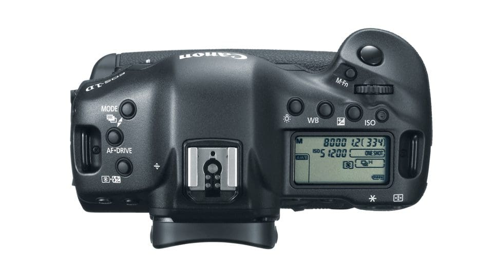 Top view of a Canon camera with buttons and display