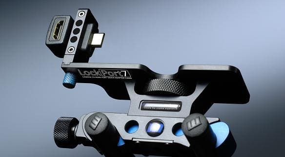 A camera accessory mount with HDMI connection port