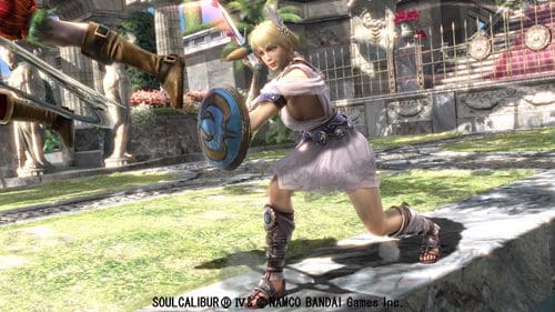 A female character in vibrant armor poses with a shield and sword in an action stance on a grassy battlefield. The background features intricate architecture and lush greenery, suggesting a fantasy setting.