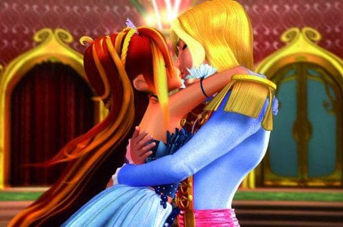 Two animated characters are embracing in a romantic kiss. The character on the left has long, flowing red hair and is wearing a sparkling blue dress, while the character on the right has long blonde hair and is dressed in a stylish blue and pink outfit. The background features ornate decorations.